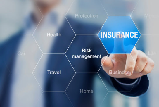 photo of man pointing to a word saying 'insurance'