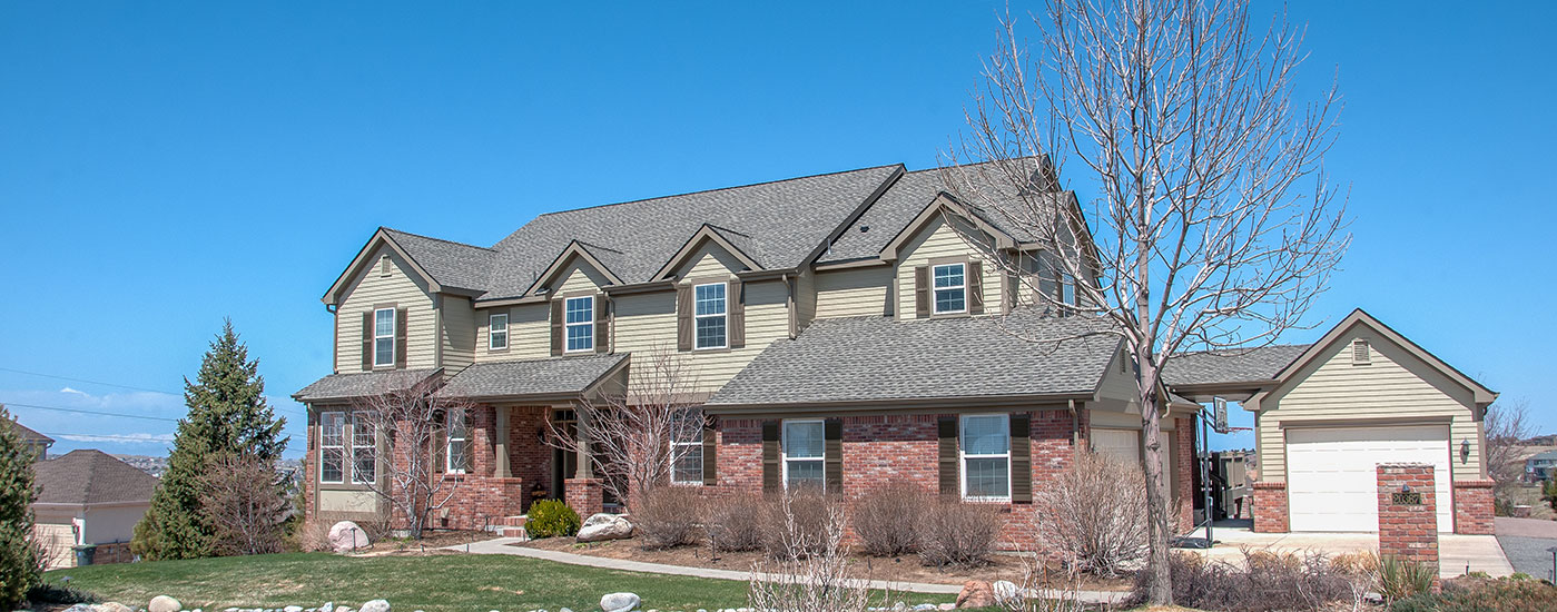 Advanced Exteriors Denver large residential home has new roof