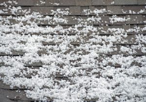 hail on a roof after a storm
