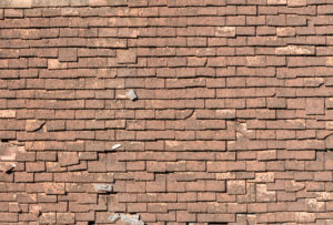 old asphalt shingled roof