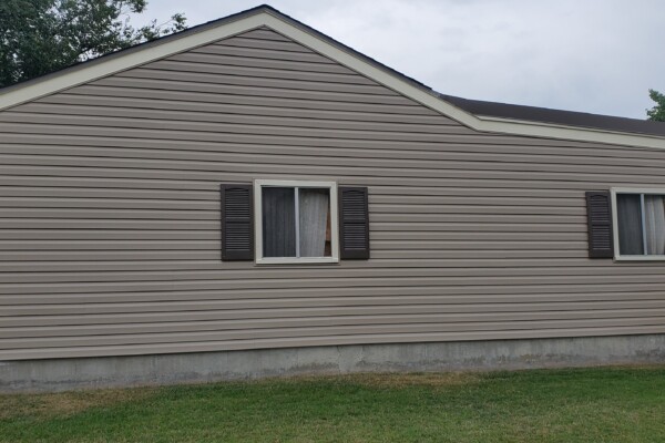full view of home after siding was repaired Advanced Exteriors Denver