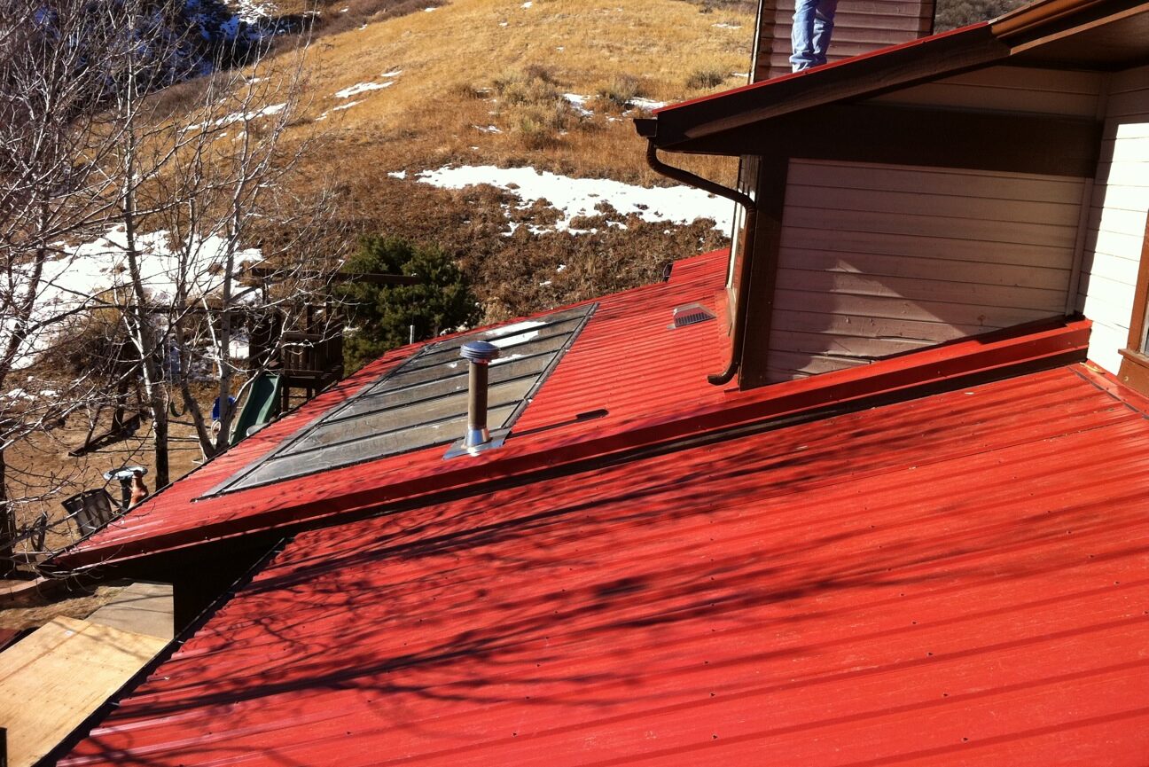 metal roof maroon color Advanced Exteriors
