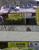 close up of roof and signage Advanced Exteriors Denver